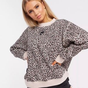 Barely worn Nike sweatshirt in leopard print, size XS